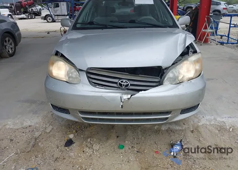 2004 Toyota Corolla Le from USA, damaged, VIN 1NXBR32E24Z258362